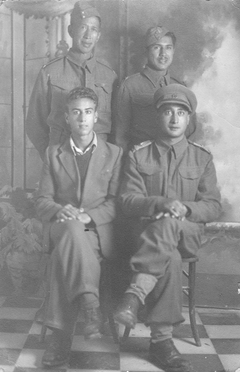 Four men in uniforms